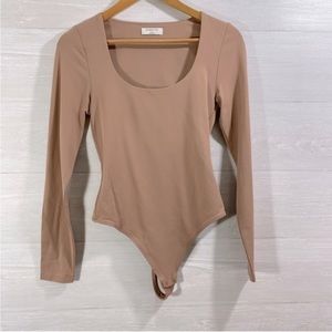 Babaton Contour Scoop Longsleeve Bodysuit Size M 
Color tan